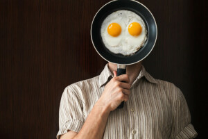 fried eggs, pan, shirt