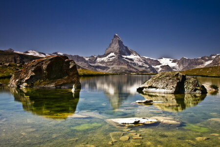 lake, mountains, snow, stones, the sky