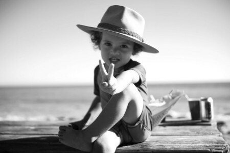 child, hand, hat, monochrome, sea, shore, water