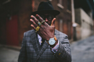 angle, beard, bokeh, city, coat, fingers, glasses, hand