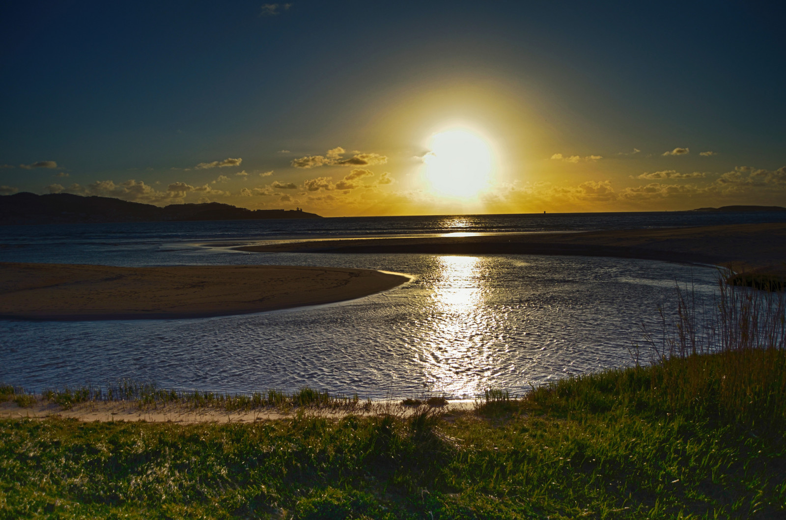 Baai, de zon, horizon