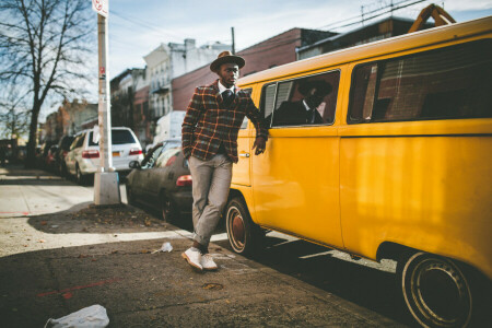 cars, city, eyes, hat, jacket, lamppost, lips, male