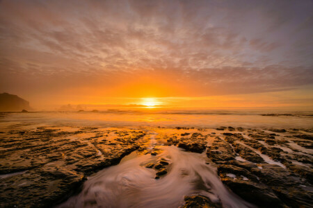 clouds, mountains, rocks, sea, shore, stones, sunset, the sky