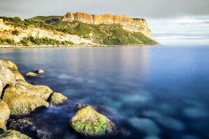 cape, clouds, rock, sea, stones, the sky