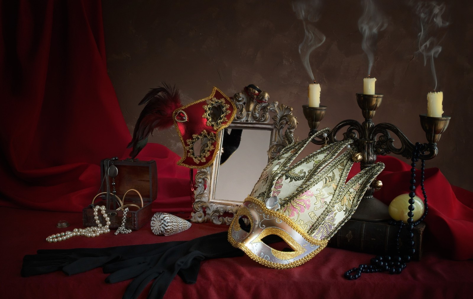 Still life, necklace, box, candles, mask, gloves, mirror, pen