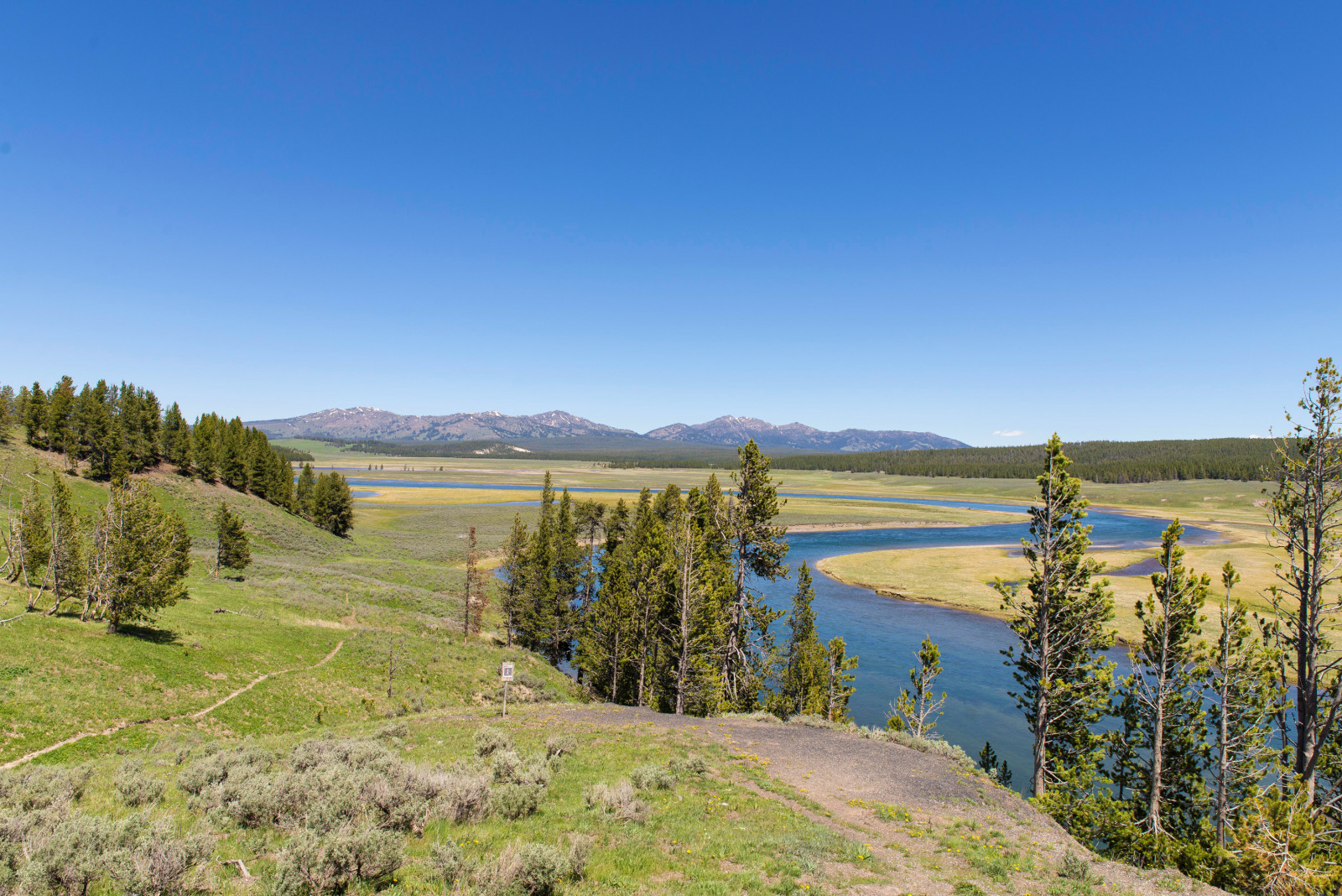 the sky, river, trees, mountains, hills