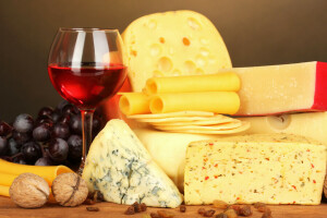 cheese, glass, grapes, nuts, wine