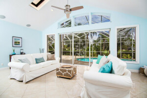 ceiling fan, cushions, doors, Garden, living room, Painting, palm trees, pool