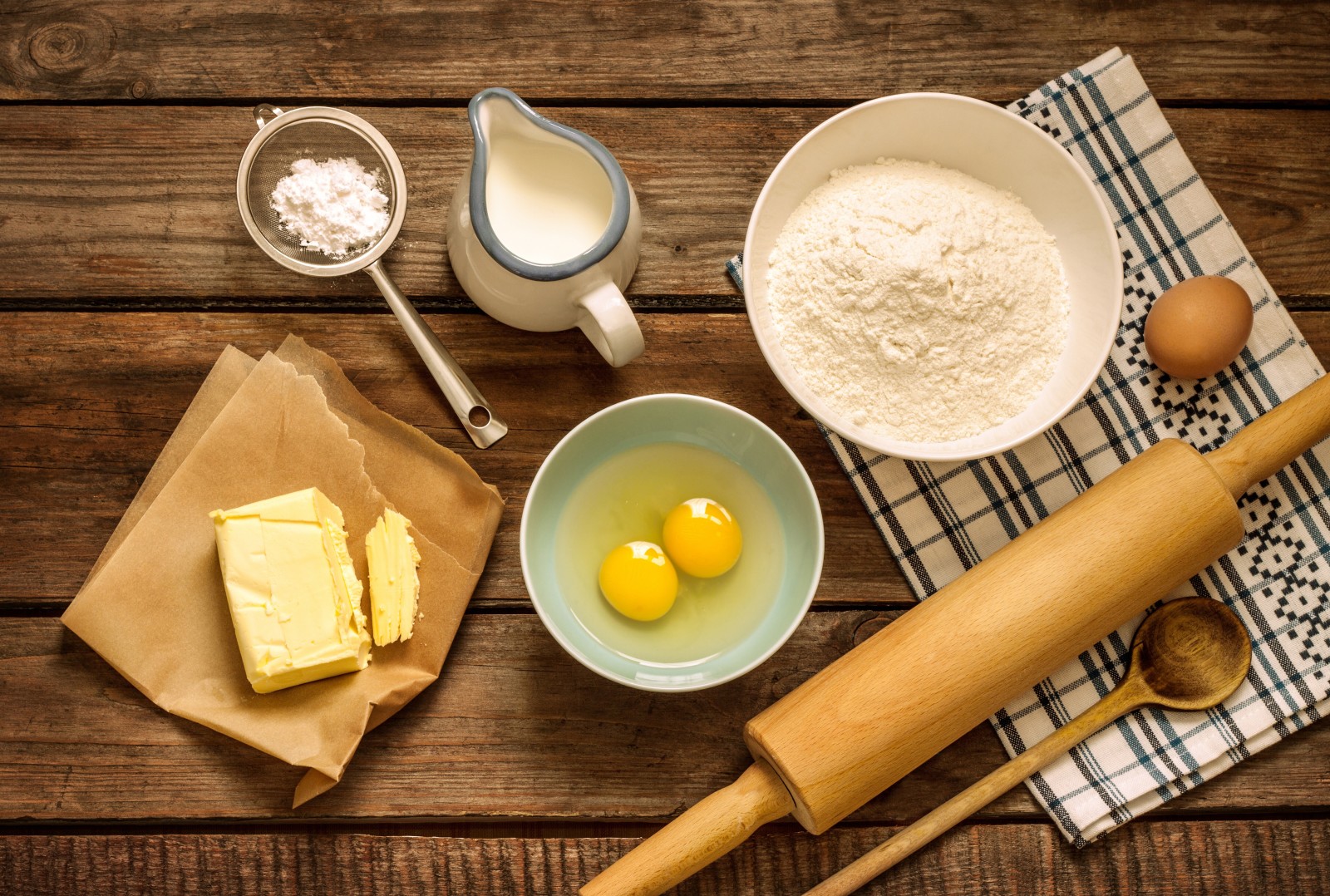 eggs, flour, oil, milk, rolling pin, strainer