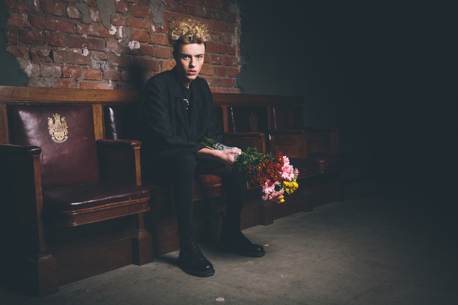 flowers, bouquet, hair, darkness, male, black clothes, seat, direct look