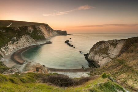 Bahía, Inglaterra, Bahía del hombre de guerra, rocas, mar, puesta de sol