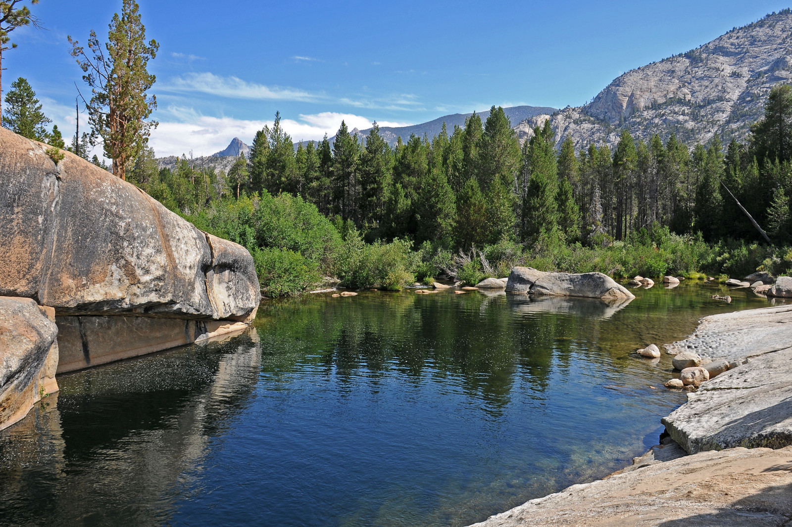 the sky, lake, stones, trees, mountains