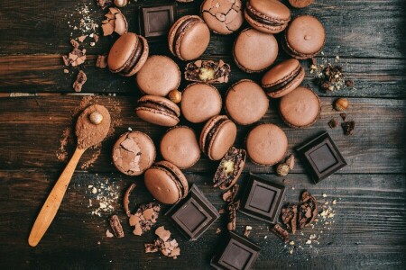 Chocolat, macaron, des noisettes, cuillère