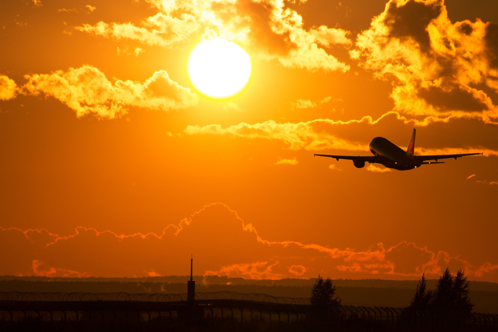 the sky, clouds, the plane, the sun, the rise