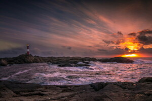 Farol, mar, pôr do sol, a noite