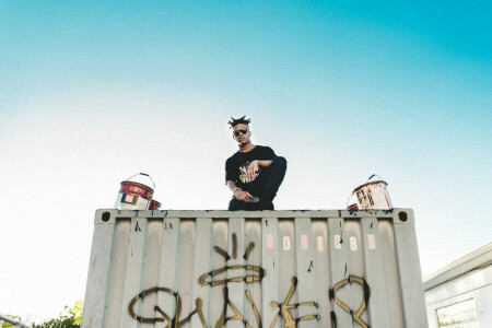 glasses, graffiti, male, mobile phone, paint buckets, the sky