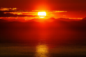 clouds, glow, mountains, sea, sunset, the sky, the sun